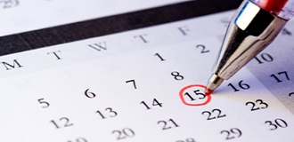 pen circling date on calendar